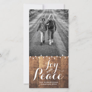 El navidad de la paz de la alegría desea las luces