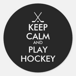 El negro guarda a los pegatinas del hockey de la