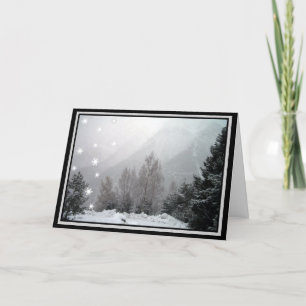 El nevar en la tarjeta de felicitación del navidad