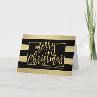 El oro de moda de las Felices Navidad raya la