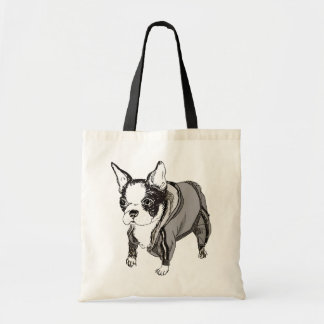 El perrito de Boston Terrier adentro suda el bolso