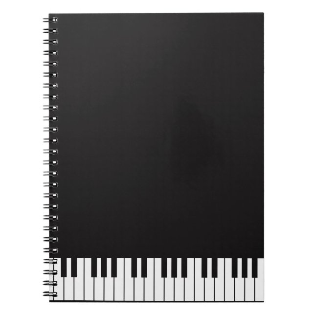 El piano cierra el cuaderno espiral (Frente)