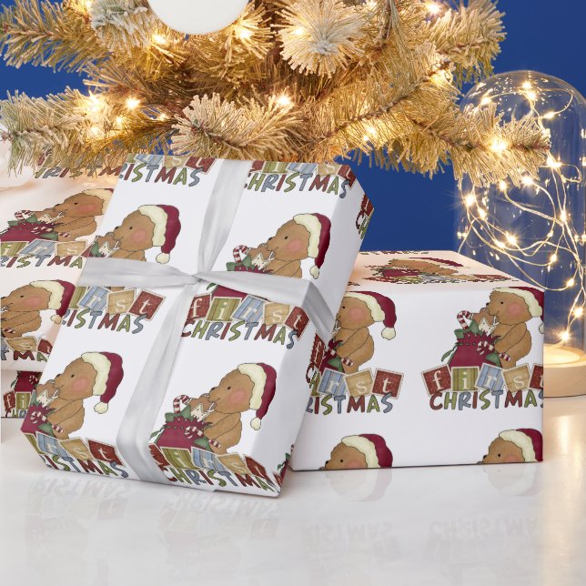 El primer papel de envoltura de Navidad para el be (Vacaciones)