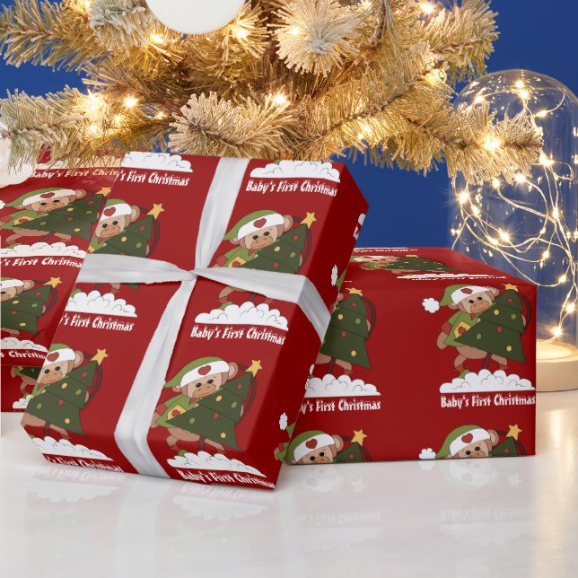 El primer papel de envoltura de Navidad para el be (Vacaciones)