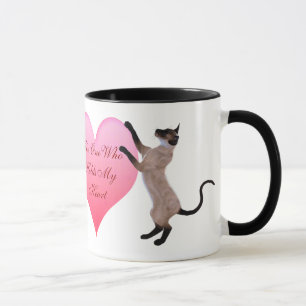 El que sostiene mi taza de corazón