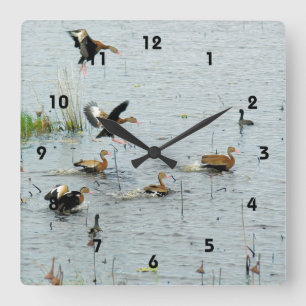 El reloj de pared de acrílico de los patos