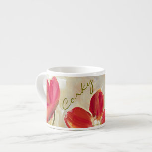 El rojo florece las tazas del café express