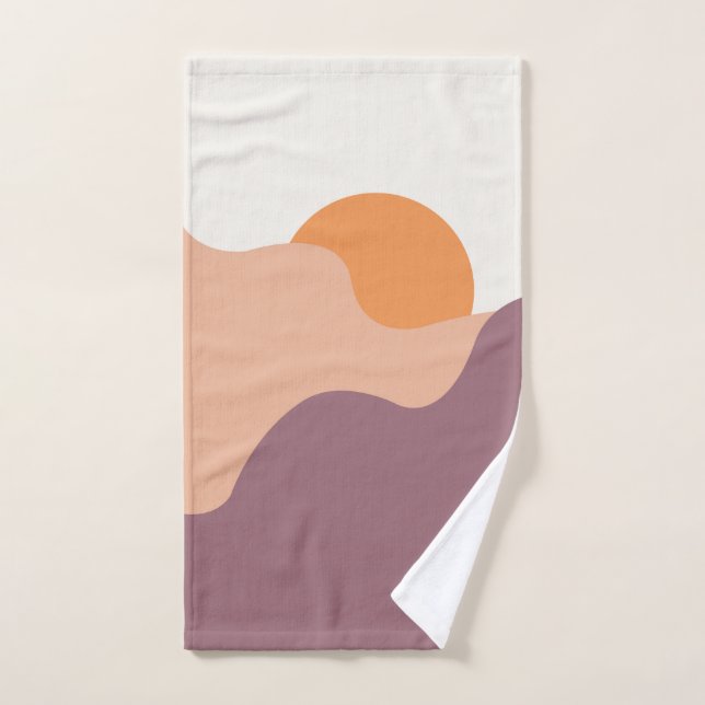 El sol cae detrás de las colinas moradas (Toalla de mano)