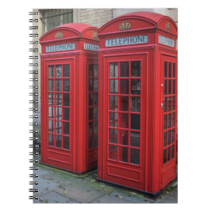 El teléfono rojo encajona el cuaderno