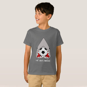 El tiburón cúbico come la camiseta de los niños