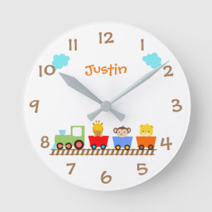 El tren animal lindo embroma el reloj de pared del