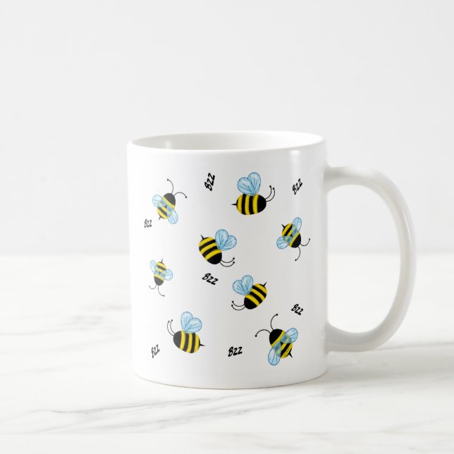 El zumbido ocupado manosea la taza de las abejas (Derecha)