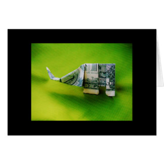 Elefante del origami de la factura del dólar sobre