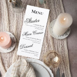 Elegant Black and White Wedding Menu Card<br><div class="desc">Elevate your reception tables with this elegant black and white wedding menu sign. Designed with a refined serif header and flowing script course titles, this minimalist layout blends timeless romance with modern sophistication. The bold “Menu” heading creates a clean focal point, while the graceful script for each course adds a...</div>