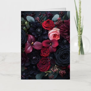 Elegante arreglo floral oscuro con rosas