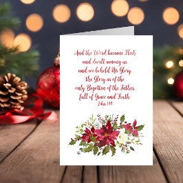Elegante biblia cristiana Navidad contra poinsetti