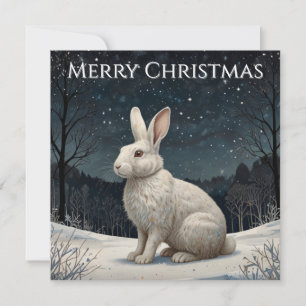 Elegante conejo blanco de Navidad en un bosque nev