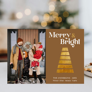 Elegante familia de árbol de Navidad dorado foto b