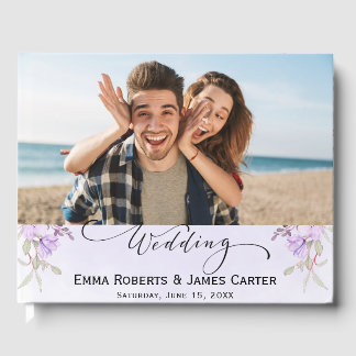 Elegante libro de invitados con flores moradas