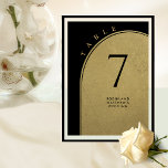 Elegante negro y oro, número de mesa de Boda de ar<br><div class="desc">Ayude a sus huéspedes a encontrar su mesa con este elegante número de mesa moderno en negro y oro. Tarjetas de doble cara. Espacio claro alrededor que le da la libertad de usar el soporte de la mesa o el marco. Atractivo diseño con arco en Relieve metalizado dorado, fondo negro...</div>