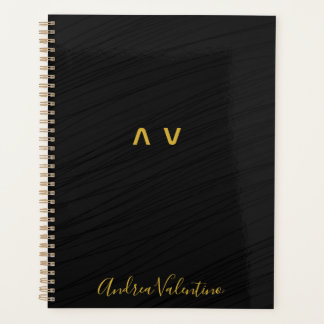 Elegante planificador diario del patrón negro