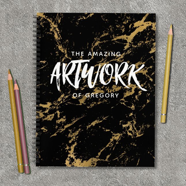Elegante portátil de cuaderno de esbozo de mármol  (A cool black and gold marble sketchbook with the words the amazing artwork of...)