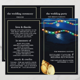 Elegante programa de bodas en la playa iluminada p