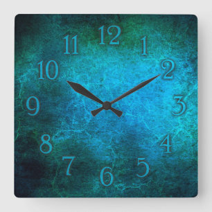 Elegante reloj de pared azul pavo real