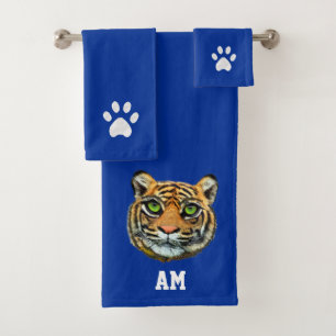 Elegante rostro de tigre, patas y monograma en azu
