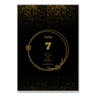 Elegante tarjeta de mesa de oro y negro