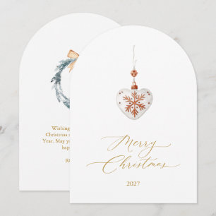 Elegante tarjeta de navidad con adorno de corazón