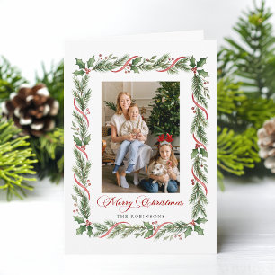Elegante tarjeta de Navidad con vegetación y cinta