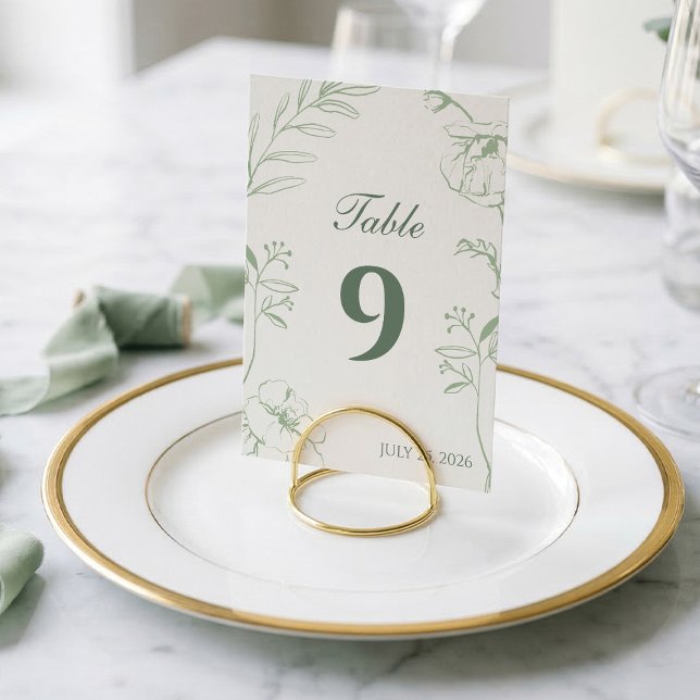 Elegante tarjeta de número de mesa de boda con art (Botanical sage green line art wedding table number styled on a gold rim plate.)