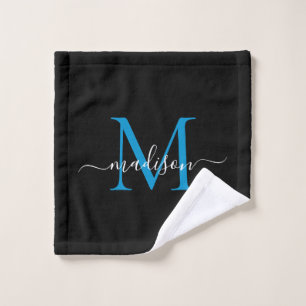 Elegante y moderno guión de monograma azul del océ