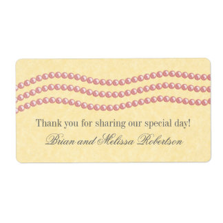 Elegantes etiquetas de boda de perlas, rosa claro