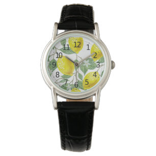 Elegantes hojas verdes y reloj femenino de lémones