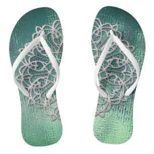 Elegantes sandalias de manala plateada