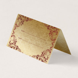 Elegantes tarjetas de plaza de mesa de oro rojas d