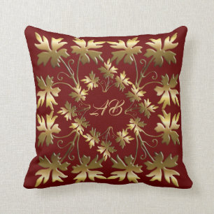 Elemento dorado con hojas tirando almohada