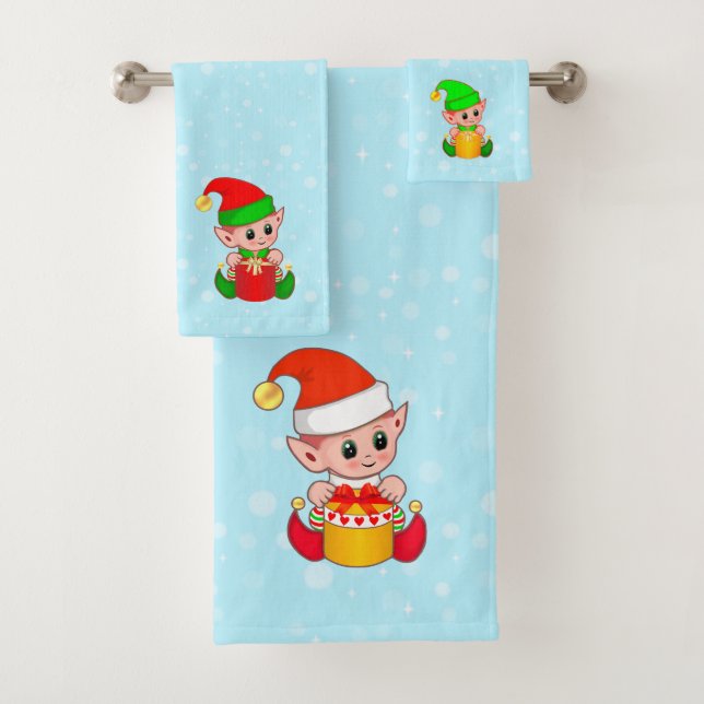 Elfos de Navidad adorables sobre azul claro (In situ)