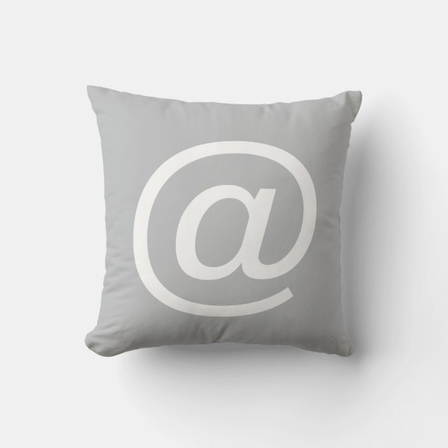@ (en el signo) almohada del botón, gris y blanco (Anverso)