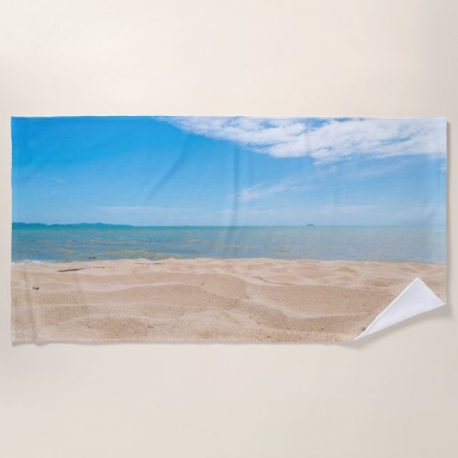 En la toalla de playa de la arena (Anverso)