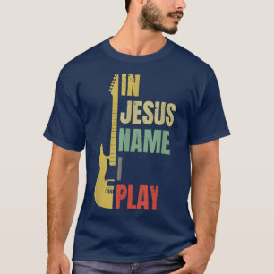 En nombre de Jesús toco una camiseta de guitarra