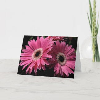 En tarjeta de felicitación rosada G_4