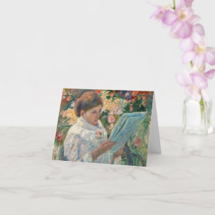 En un balcón de Mary Cassatt con tarjeta plegada