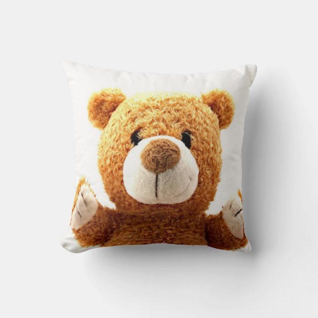 Encima de la almohada marrón linda cercana del oso (Anverso)