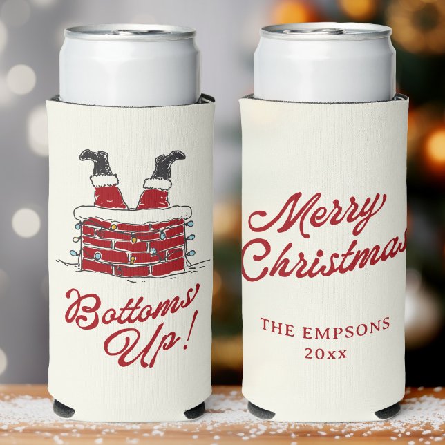 Enfriador De Latas Slim Divertida Navidad Santa Arriba las Copas Amig Navi (White Christmas can cooler featuring Santa’s boots-up in a brick chimney, cheery “Bottoms Up!”)