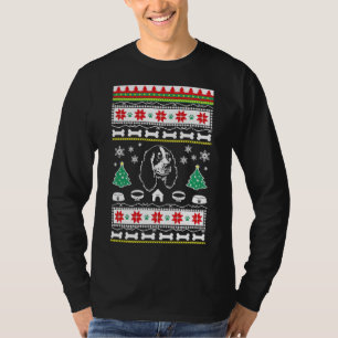 English Springer Spaniel ama a suéter navideño feo