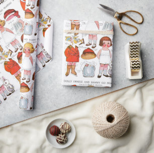 Envoltura de regalo de muñecas de papel navideño