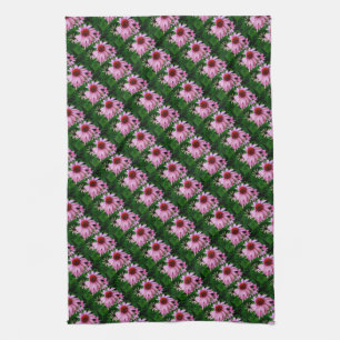 equinácea rosa sobre toalla verde